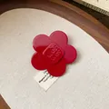 Detailed view of a vibrant red resin flower hair clip with embossed square center detail - Flower Style (9#)