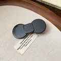 Minimalist black resin hair clip with an elegant bowtie design on a rustic wooden tray - Geometric Style (17#)