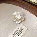 Close-up of resin flower hair clip with pearl-like luster and square center engraving - Flower Style (1#)