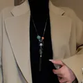 Élégante longue chaîne de pull avec un pendentif en zircon et un joli pompon noir - Collier (32)