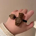 Brown teddy bear hair tie with sparkling rhinestone geometric bead on elastic band. - Brown Bear Rhinestone Style