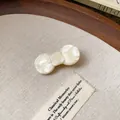 Elegant cream resin hair clip with a pearl-like finish and minimalist engraved detail - Geometric Style (10#)