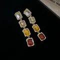 Detailed view of vintage gold earrings featuring multi-colored square crystals - Square Earrings (925 Sterling Silver Earring Post)