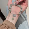 Handmade green strawberry crystal beaded bracelet with silver butterfly charm detail - Style 8 Green Glaze (Butterfly Charm)