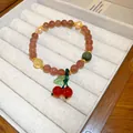 Handmade strawberry crystal beaded bracelet featuring a cute cherry charm in jewelry box - Style 100 Purple Strawberry Crystal (Cherry Charm)