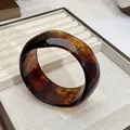 Bracciale rigido in resina con motivo tartarugato, finitura lucida nei toni del marrone - 65# Bracciale Rigido Largo Vintage Tartarugato (WB941) / Marrone