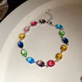 Gros plan d'un bracelet en zircone multicolore avec pierres ovales au design vintage - Style Ovale Multicolore (2#)