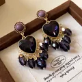 Close-up of vintage purple heart and teardrop tassel earrings in a jewelry box. - 4# Gold Purple Heart (Silver Earring Post)
