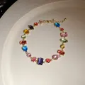 Vue détaillée d'un bracelet vintage doré avec des zircons multicolores - Style Ovale Multicolore (9#)