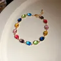 Vue détaillée d'un bracelet vintage avec zircons ovales multicolores dorés - Style Ovale Multicolore (1#)