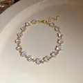 Détail d'un bracelet vintage doré avec des pierres en zircon en forme de cœur sur une assiette. - Style Coeur Transparent (4#)