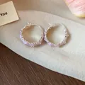 Detail view of sweet purple enamel flower hoop earrings with a silver-toned finish - Huggie Earring (HE30850) / Light Purple
