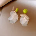 Detailed view of lime green stud earrings with cascading white pearlescent sequin drops - Clip-on Earrings (5#)