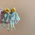 Detailed view of handmade flower drop earrings featuring blue polka dot silk ribbons - Silver Post Stud Earrings (6#)