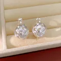 Eleganti clip per orecchie a sfera cava intrecciata color argento placcate oro 18k. - Argento