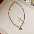Collier ethnique rétro en perles d'œil de tigre avec pendentif ovale soleil - 42# Collier (ai-HN7730) / Or avec Multicolore