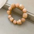 Close-up of chunky acrylic bracelet with marble pattern square and round beads - 2# / Light Coffee
