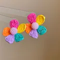 Vibrant multi-colored woven raffia flower earrings with delicate pink pearl centers - Steel Post Stud Earrings (82#)
