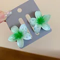 Elegant pair of green gradient plumeria flower hair claw clips for women styling - 2 Pcs/Set / Green - Blue