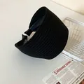 Close-up detail of a stylish wide black ribbed velvet headband for elegant hair styling - Black Knitted Style (HH6804)