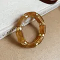 Elegant retro amber marbled acrylic bracelet with golden metal spacers for women - Amber With Gold
