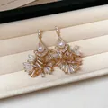 Eleganti orecchini pendenti con nappe in zircone e perla color champagne - Stile Nappa in Cristallo e Perla Artificiale di Lusso Leggero (68#) / Oro