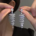Elegant silver-toned tiered chandelier earrings with sparkling pear-shaped crystals - Stepped Cascading Drop (45#)