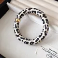 Fashionable acrylic leopard print chunky link bracelet with a polished gold-tone metal accent - Style 54 Blue Tropical Print