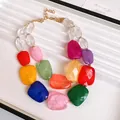 Close-up of a vibrant double-layered acrylic beaded necklace with irregular colorful gems - Necklace / Colorful