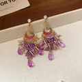 Eleganti orecchini a nappa in zircone viola con finitura dorata di lusso - Stile Cuore Vuoto con Perno in Argento 925 (85) / Viola