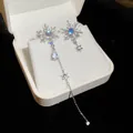 Asymmetrical snowflake drop earrings with blue zircon and silver finish in a jewelry box - Silver Post Asymmetric Snowflake Tassel (31#)