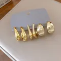 Detail van drie paar minimalistische onregelmatige geometrische gouden oorknoppen - 4# Zilveren Pin (6-Delige Set) / Goud