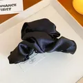 Close-up of elegant black satin fabric hair claw clip with smooth texture - 9# Claw Clip - Satin Style