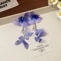 Eleganti orecchini a nappa in tessuto a farfalla viola con zirconi scintillanti. - Stile Gancio per Orecchio con Nappa in Zirconia e Farfalla in Tulle (93#) / Blu Violetto