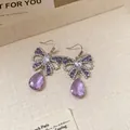 Eleganti orecchini a farfalla in zircone viola con pendenti in cristallo a forma di goccia. - Stile Farfalla a Goccia (98# Gancio per Orecchio) / Argento-Viola