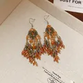Eleganti orecchini bohémien con nappe di cristallo in tonalità ambra e oro scintillante. - Stile Nappa Bohemien (106# Gancio per Orecchio) / Argento-Verde-Caffè