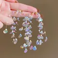 Close-up of colorful beaded tassel earrings with iridescent sequins and crystal drops - 19#