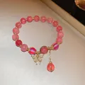 Elegant pink cat eye stone beaded bracelet with a sparkling crystal butterfly pendant charm - Butterfly Charm Style (17#)