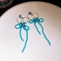 Eleganti orecchini a nappa in argento con farfalle in cristallo blu e graziosi cuori. - Stile Cuore Farfalla Blu (29#)