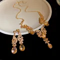 Elegant champagne rhinestone necklace and water-drop earring set in vintage court gold style. - Necklace + Earrings Set / Champagne