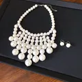 Detail view of a French vintage multi-layer pearl bib necklace and earring set - Necklace and Earring Set / White