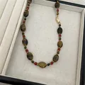 Collier vintage style ethnique en œil de tigre ovale avec perles rouges et or - 48# Collier (Plaqué Or 18K) / Marron
