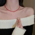 Elegant minimalist red agate bead choker necklace shown as worn on a model's neck - 20# Necklace - Gold - Red