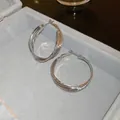 Elegant silver-toned twisted oval hoop earrings with a textured multi-layered design - 21# Multi-layer Streamlined Oval Hoop / Silver