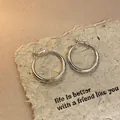 Minimalist silver oval hoop earrings with a trendy polished finish and sleek design - Small / Simple Oval Hoop Style (50#) / Silver