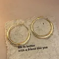 Elegant gold-colored oval hoop earrings with a smooth minimalist finish for women - Medium / Simple Oval Hoop Style (53#) / Gold