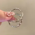 Stylish silver textured oval hoop earrings featuring a unique hammered design for a chic look - Hammered Texture Oval Hoop (59#) / Silver
