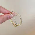 Elegant gold oval hoop earrings with sparkling crystal rhinestones for a chic look - Rhinestone Oval Style (92) / Diameter 38mm / Gold