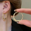 Minimalist irregular gold hoop earrings with a stylish melted oval design for women - Irregular Lava Texture Oval Hoop Earrings (109#) / Gold