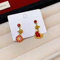 Detailed close-up of red and gold asymmetric earrings with Chinese coin and pony charms - Bountiful Wealth Horse Style (10#) / Gold-Red